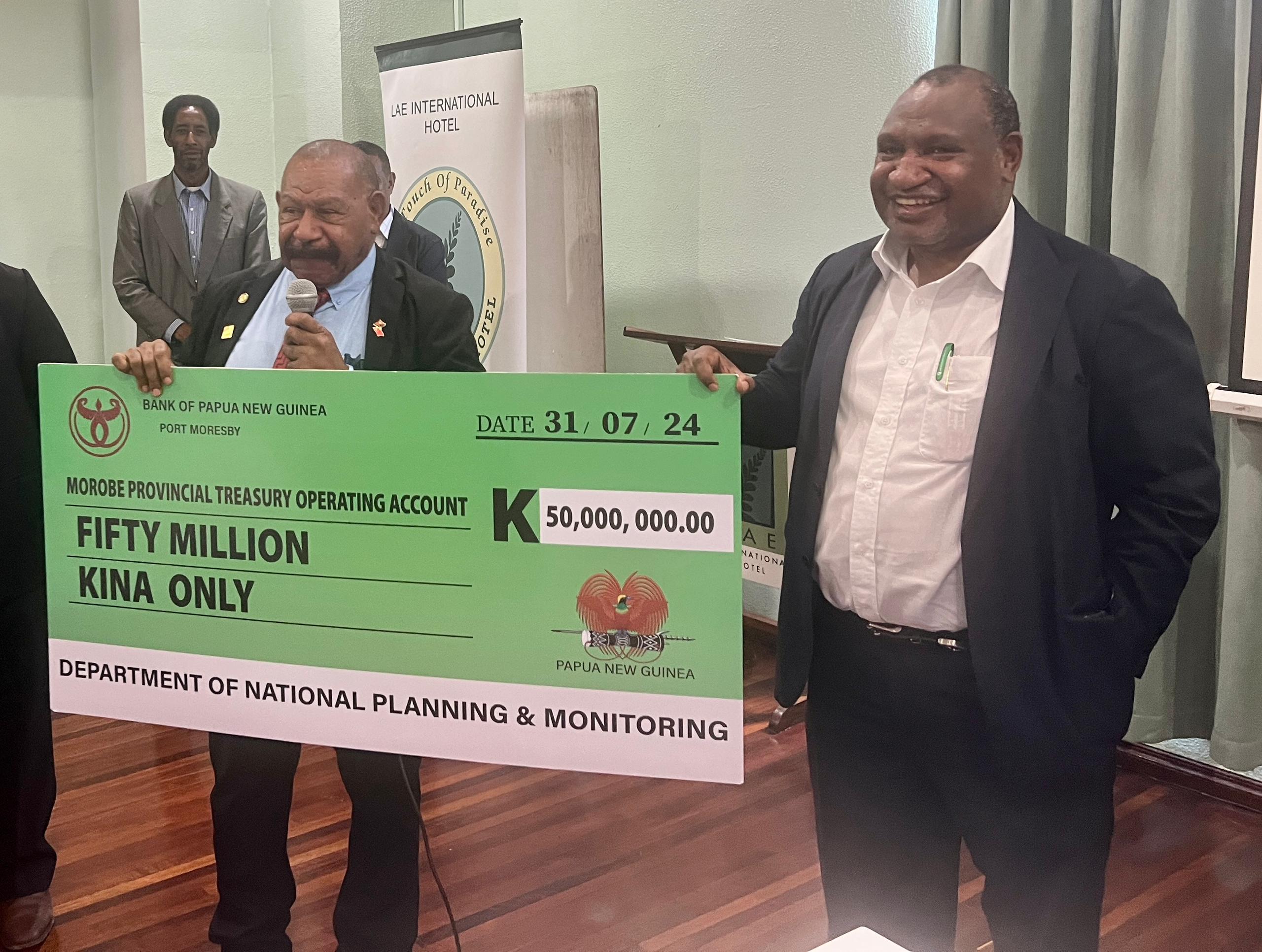 Prime Minister Marape Presents K50 Million Infrastructure Development Grant to Wafi-Golpu Landowners and Morobe Provincial Government